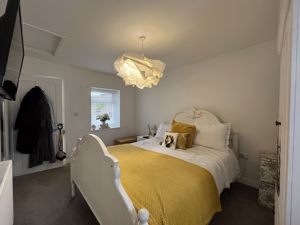 Bedroom One- click for photo gallery